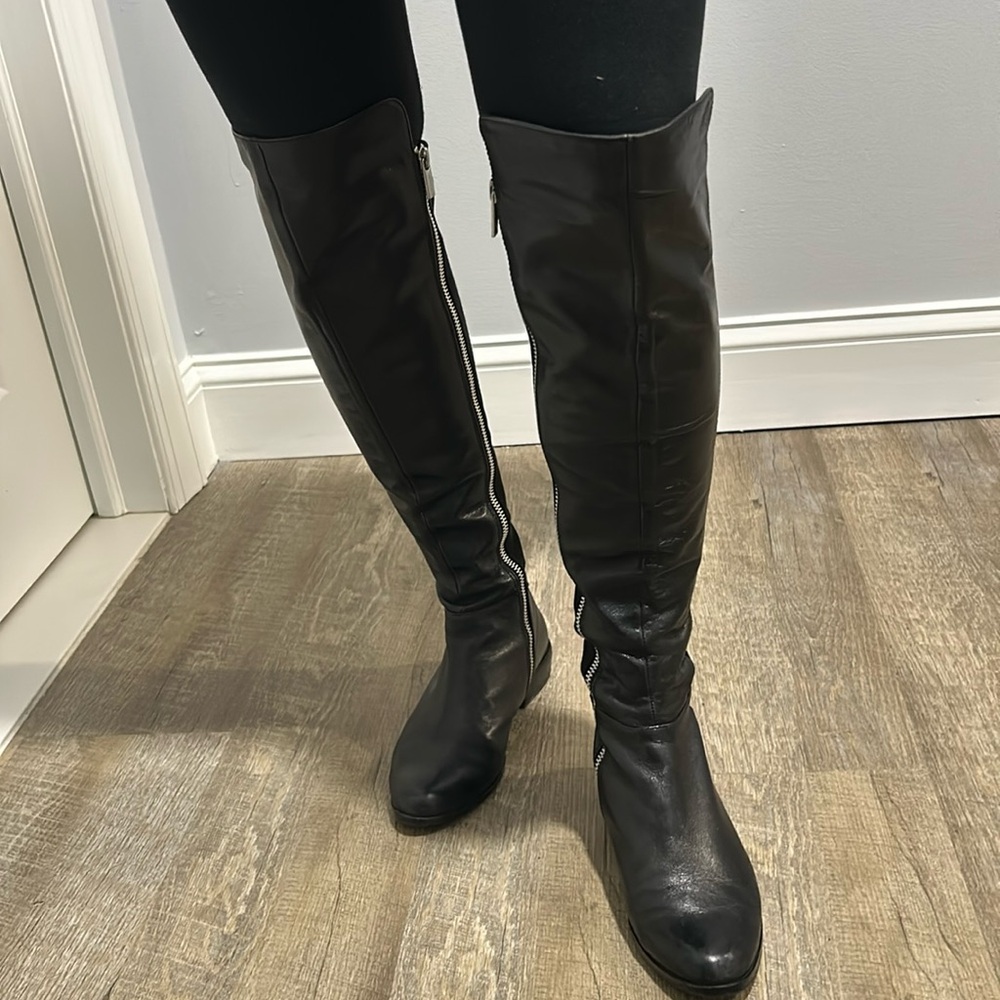 Michael Kors black boots.
